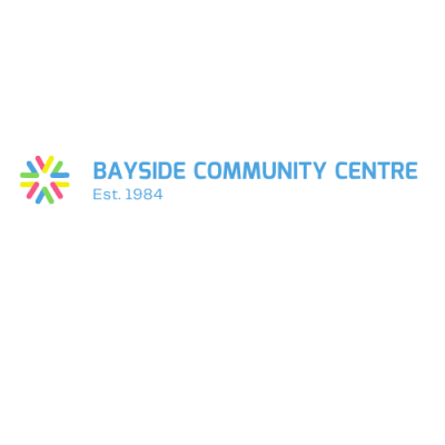 Text in blue BAYSIDE COMMUNITY CENTRE. Colored wheel with yellow, green, blue and red prongs.
