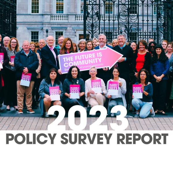 The cover of the 2023 policy survey report. On the cover is an image of a group of people holding a sign that says "The Future is Community"