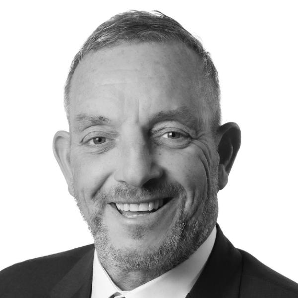 Black and white headshot of TD Jerry Buttimer