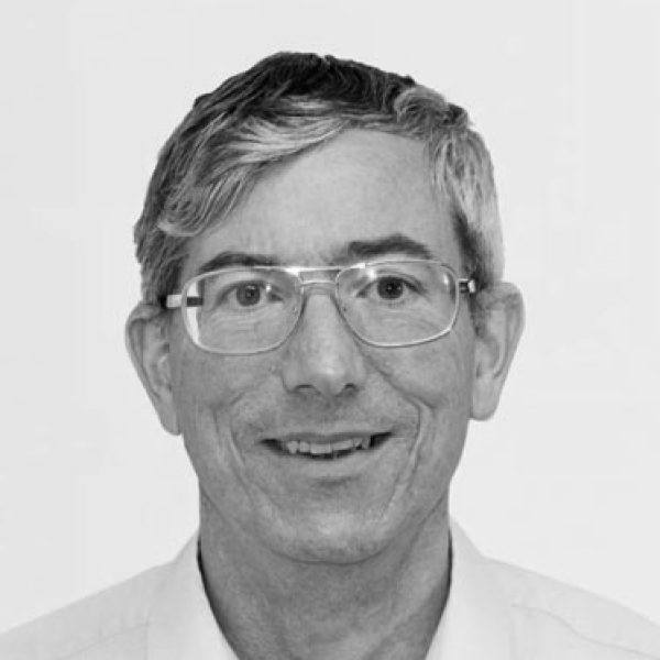 A black and white headshot of Eamonn Kelly