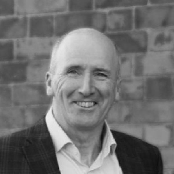 Black and white headshot of Michael Nason
