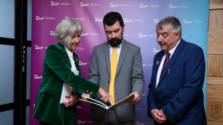 An image of Deirdre Garvey, Minister Joe O'Brien, and Vincent Keenan at Summit 2022