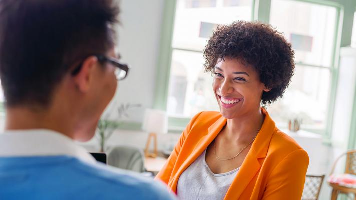 Two people engaged in coaching