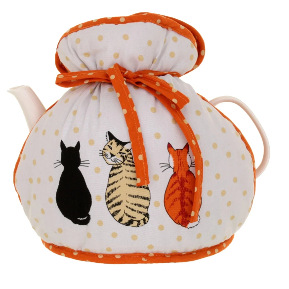 A tea cosy with cats printed on it