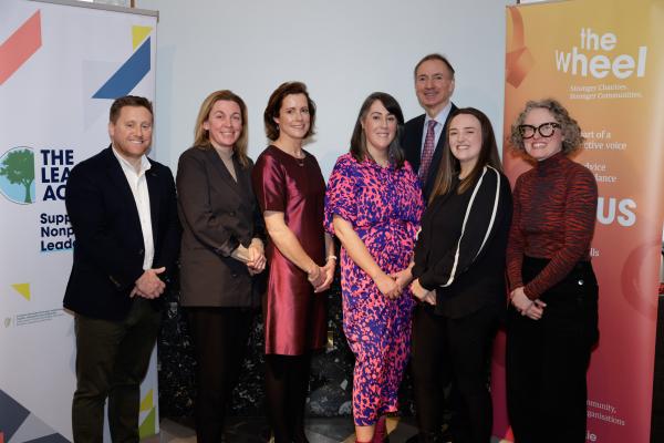 Photo showing staff from  The Wheel and TU Dublin announcing apprenticeship MOU