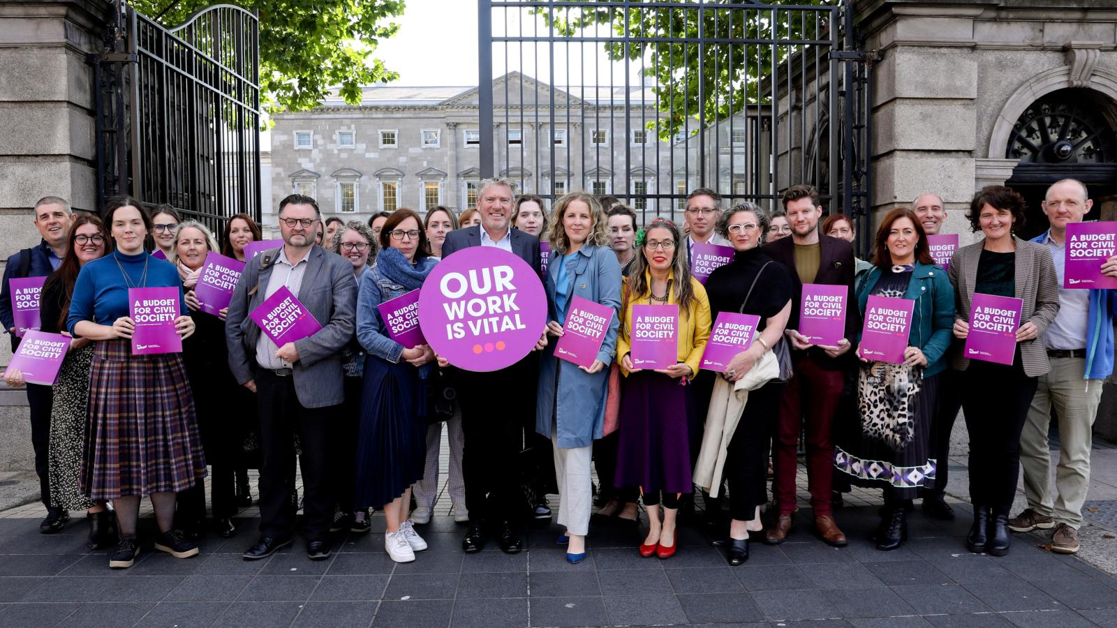 A group of sector workers gathered outside Leinster House in support of A Budget for Civil Society