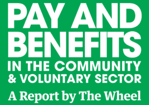 White text on a green background reads: Pay and Benefits in the Community & Voluntary Sector. A Report by The Wheel..