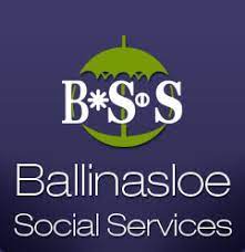 Logo for Ballinasloe Social Services. The image features a green umbrella icon with the initials B*S*S inside it, above the organizations name written in white text on a dark blue background.