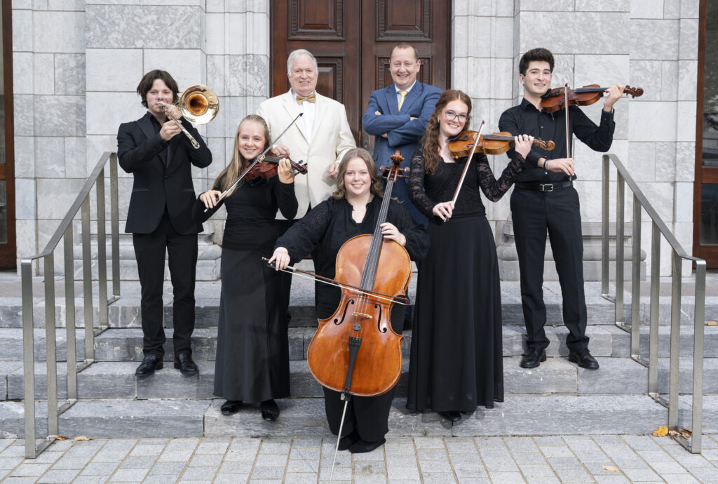 EY Cork is continuing its support of Cork Youth Orchestra for a third consecutive year, helping to bring the orchestra’s much-loved Christmas Concerts back to Cork City Hall this December. Pictured at the launch are Tomás McCarthy, Musical Director, Cork Youth Orchestra; Ronan Murray, EY Cork Office Managing Partner, with Ultan McCarthy, Maire O'Leary, Grace O'Connell, Grainne Crowley and Efe Erkol members of Cork Youth Orchestra.
